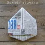 Capacul de ziar cu un vizor