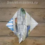 Capacul de ziar cu un vizor