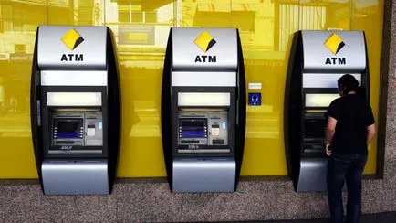 50 de ani cu privire la problema de bani ca un ATM (bancomat) de bază de lucru 50 de ani cu privire la problema de bani ca o mașină de numerar