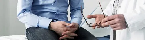 варикоз яєчок у чоловіків симптоми