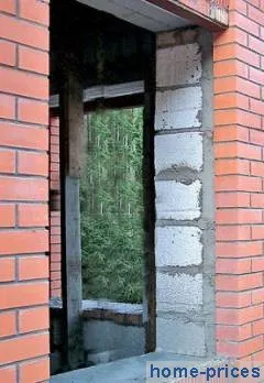 A becslés az építési házak téglából