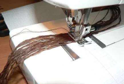 Hogyan kell varrni a haj textil baba