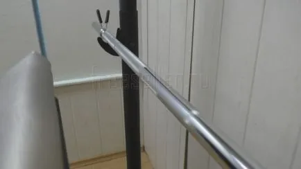 A recepció a rúd a kezét