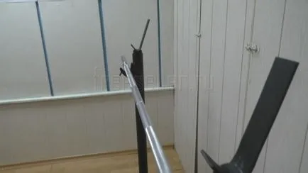 A recepció a rúd a kezét