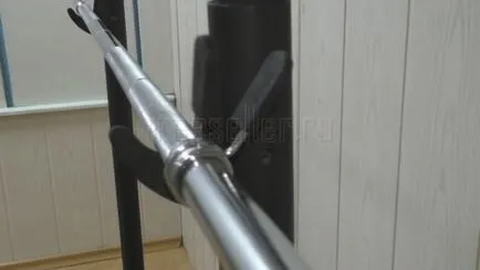 A recepció a rúd a kezét