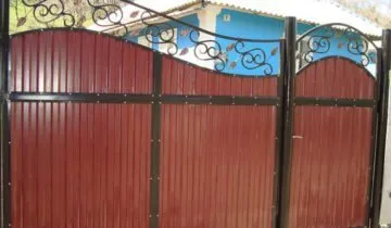 Hogyan építsünk egy kapu hullámkarton kezeddel lépésről lépésre rajzokkal és a számítások