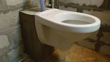 Telepítése vécécsésze kezével egy magánházban