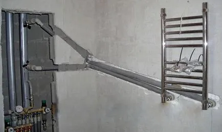 Cseréje törölközőmelegítővel a fürdőszobában - a szakaszában a videó munkák
