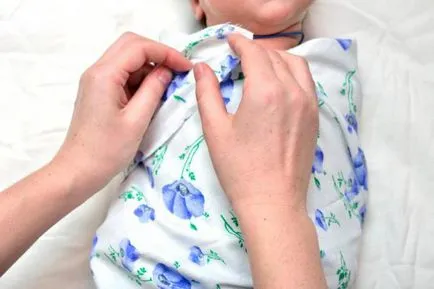 Akár milyen korú gyermekek swaddled bepólyáz hogy a gyermek legyen