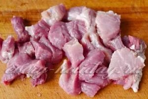 Sertéssült egy serpenyőben hagymás recept egy fotó