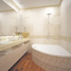 Tervezés fürdőszoba sarokkáddal fotó