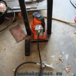 Hogyan készítsünk egy hidraulikus prés a kezüket