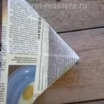 A kupak az újság egy üveggel