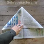 A kupak az újság egy üveggel