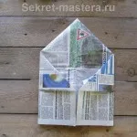 A kupak az újság egy üveggel