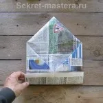A kupak az újság egy üveggel