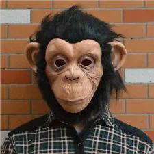 Monkey maszk a kezét