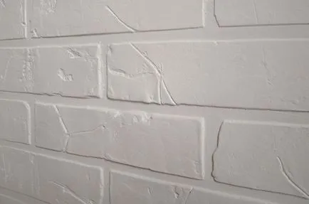 Utánzat falazat a kezüket