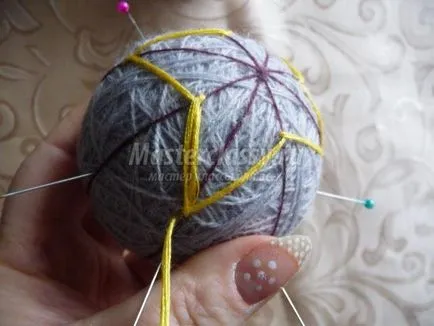 Temari labdák kezével utasításokat, hogyan kell csinálni egy fotó és videó