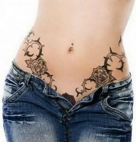 Tattoo gyomra a nők szülés után, hogy elrejtse a striák