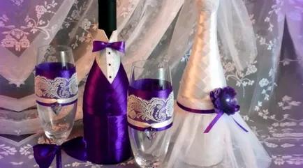 Így esküvői poharak és palackok a kezét díszítő felszerelések