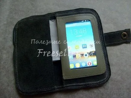 Case-könyv a telefon kezével