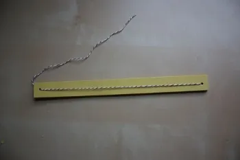 Karácsonyi lámpás a kezüket