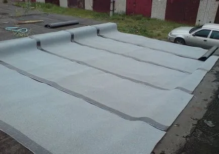 Javítása a tető a garázs kezével