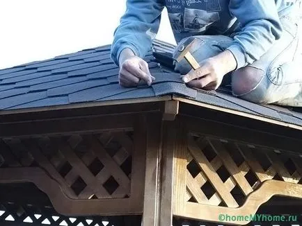 Fa pavilon a kezüket
