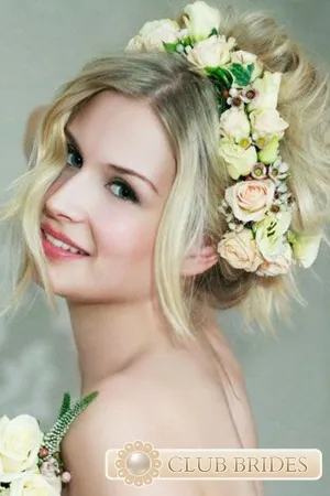 Esküvői frizura virágkoszorú fotó (frizura) Esküvői frizura virágkoszorú Photo
