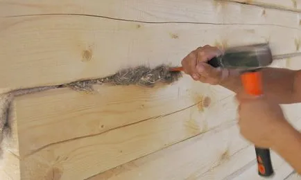 Как да силикон къщата от начина бар konopatki (видео)