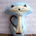Възглавница-котка котка възглавница с ръцете си