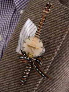 Boutonniere a kezüket rostanyagok és a gyűjtemény inspirációt