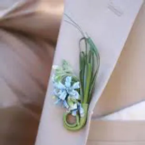 Boutonniere a kezüket rostanyagok és a gyűjtemény inspirációt