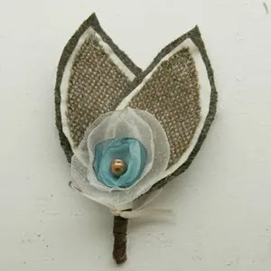 Boutonniere a kezüket rostanyagok és a gyűjtemény inspirációt