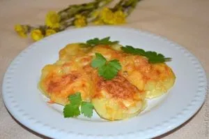 Печени картофи със сирене и лук
