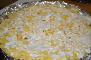 Печени картофи със сирене и лук