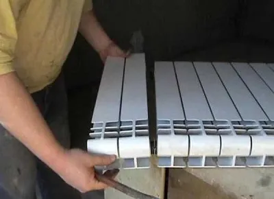 Изчисляване на части от алуминиеви радиатори на квадратен метър, както е необходимо батериите на стаята и частния
