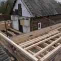 Къща на цилиндрични блокове с ръцете си и как да се изгради видео