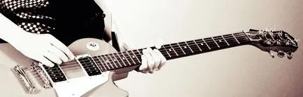 Játszik elektromos gitár