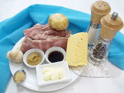 Какво можете да направите от картофи и месо - пържоли с картофи на фурна