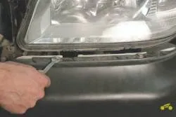 Как да премахнете бронята на Chevrolet Нива