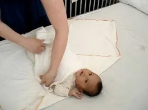 Да се ​​научиш как да възпирам новородено - защо повит новородени, правила пелени