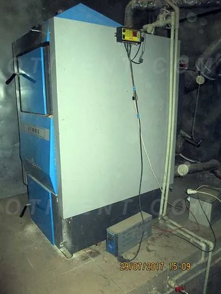 Instalarea cazanului cu combustibil solid cu mâinile ca alimentarea și conectarea la încălzire
