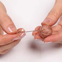 Hogyan készítsünk egy végtelen gyöngyök - kézzel készített