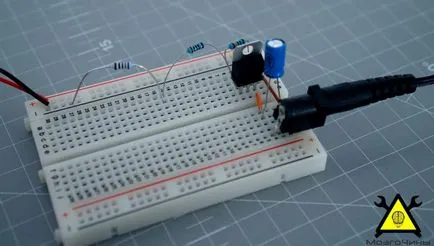 sursa de alimentare universală pentru breadboard cu mâinile lor