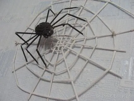 Keze pók a hálójában újság csövek, pro merített
