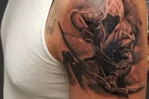 fotó Tattoo Nyilas - a konstelláció a férfi és női tetoválás Yurets szívében tölgy