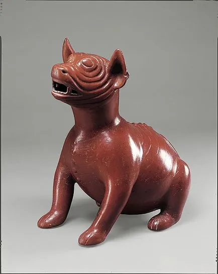 câine antic în figurine de piatră și bronz și pandantive